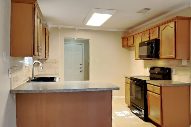 kitchen with sink, crown molding, kitchen peninsula, decorative backsplash, and black appliances