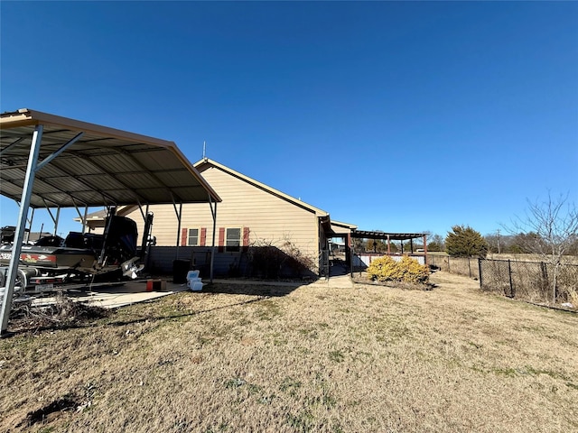 view of yard with a carport