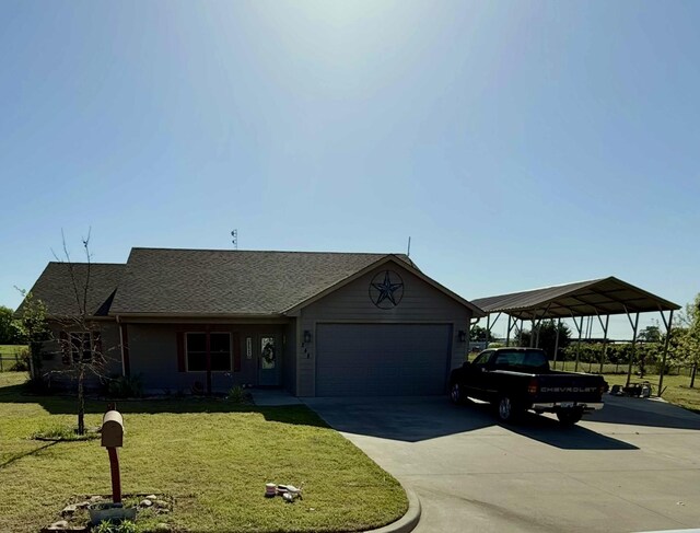 248 Mill, Emory, TX 75440 - ranch-style home with an attached garage, driveway, a front yard, and a carport