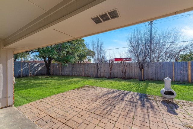 view of patio / terrace featuring visible vents and a fenced backyard