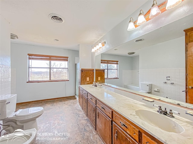 full bathroom with independent shower and bath, vanity, and toilet