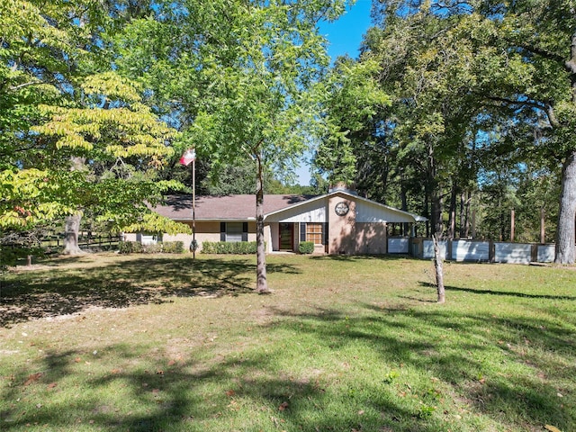 exterior space featuring a front yard