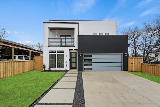 contemporary home featuring a balcony and a front lawn