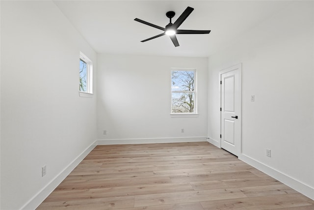 unfurnished room featuring light hardwood / wood-style flooring and ceiling fan