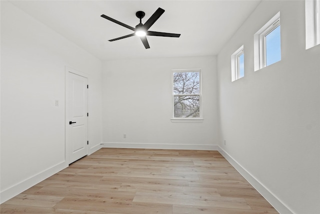 spare room with ceiling fan and light hardwood / wood-style flooring