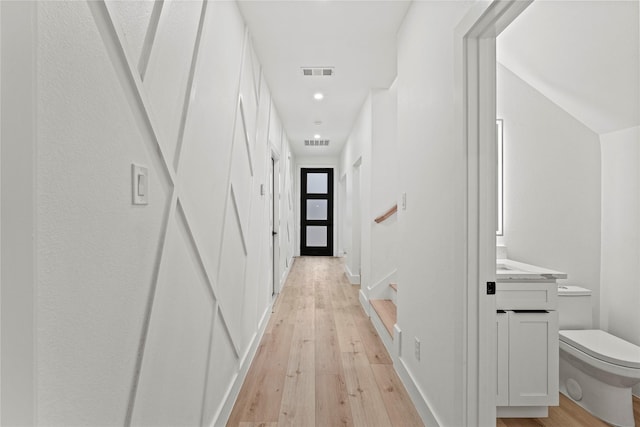 hallway featuring light wood-type flooring