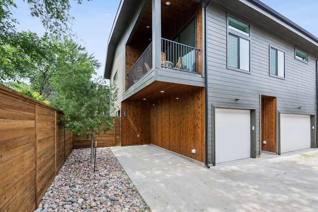 2138 Lovedale Ave Unit 105, Dallas, TX 75235 - view of property exterior with an attached garage and fence