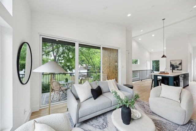 2138 Lovedale Ave Unit 105, Dallas, TX 75235 - living area with recessed lighting, vaulted ceiling, and light wood-type flooring