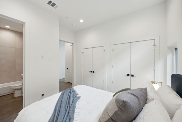 2138 Lovedale Ave Unit 105, Dallas, TX 75235 - bedroom with ensuite bathroom, visible vents, recessed lighting, and two closets