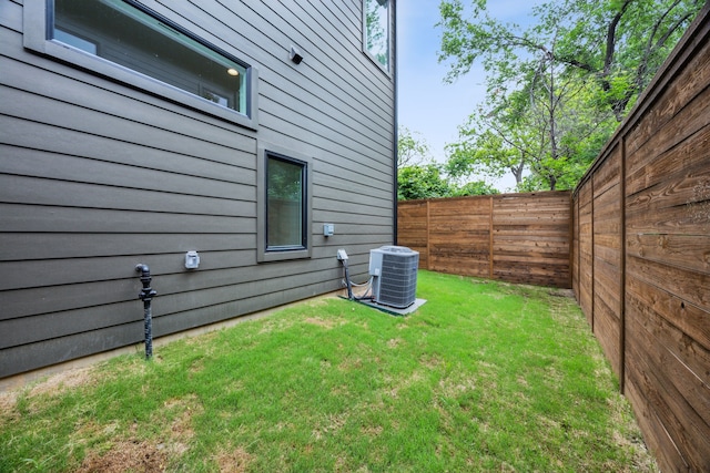 2138 Lovedale Ave Unit 105, Dallas, TX 75235 - view of yard with a fenced backyard and central AC unit
