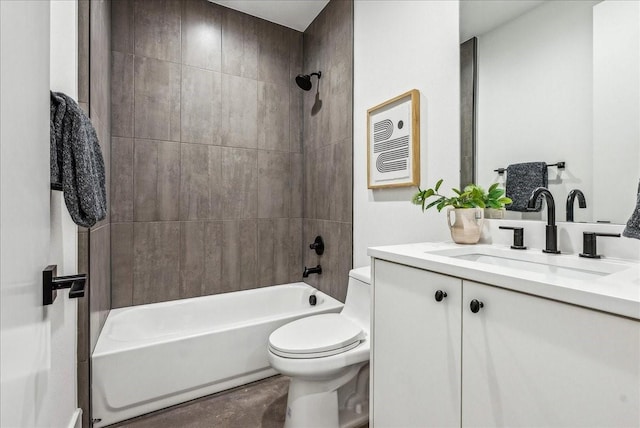 full bathroom featuring vanity, toilet, and tiled shower / bath