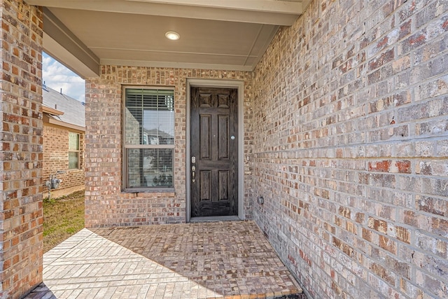 doorway to property featuring a patio area