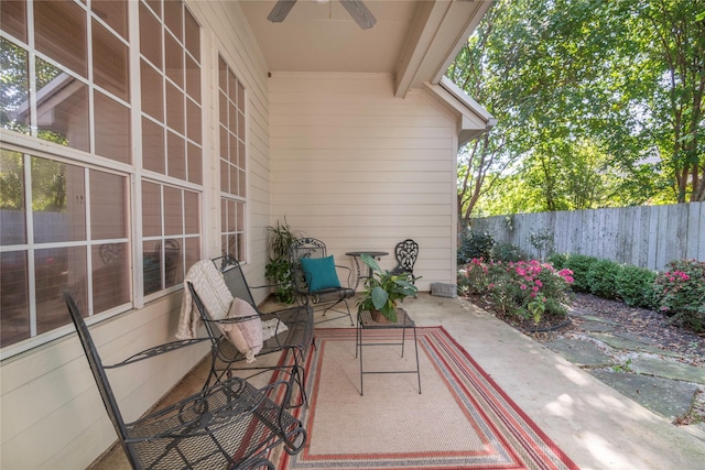 view of patio featuring ceiling fan