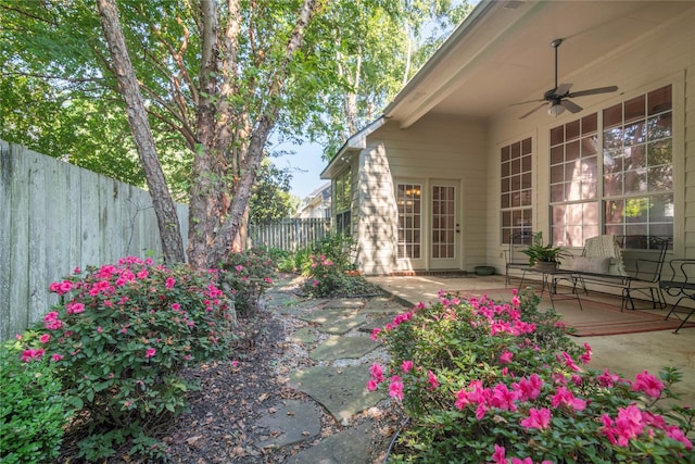 view of patio featuring ceiling fan