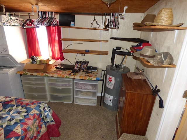 bedroom with washer / dryer, carpet, and electric water heater