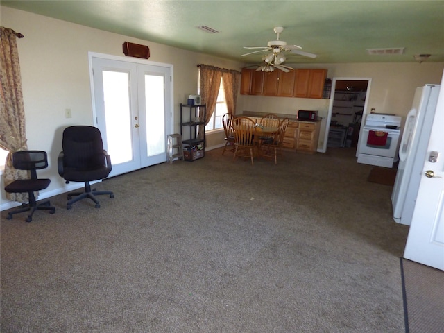 interior space featuring baseboards, visible vents, and french doors