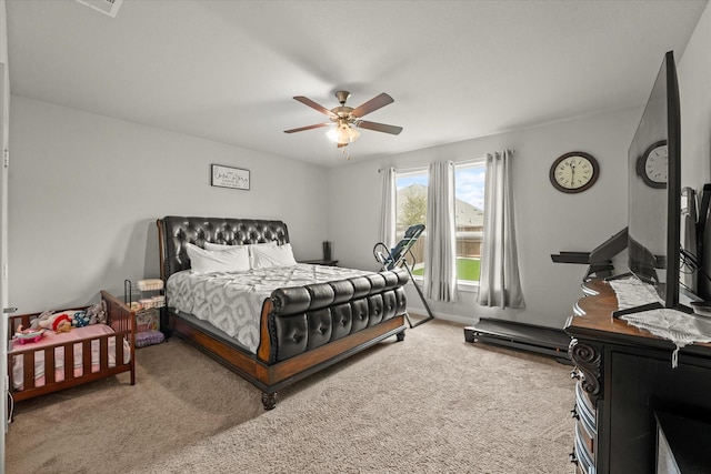 bedroom featuring ceiling fan and carpet flooring