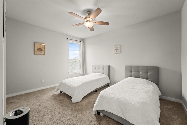 bedroom featuring ceiling fan and carpet floors