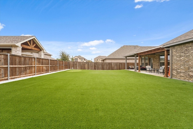 view of yard with a patio area