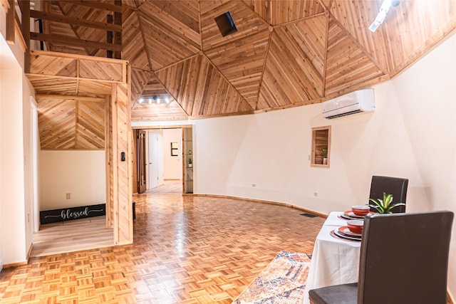 interior space with light parquet flooring, a wall mounted AC, and wood walls