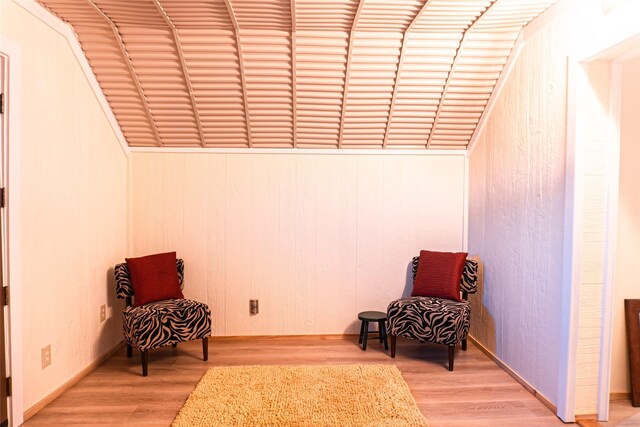 interior space featuring vaulted ceiling