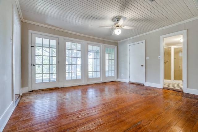 empty room with wood ceiling, crown molding, light hardwood / wood-style floors, and ceiling fan