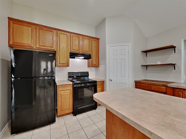 kitchen with lofted ceiling, backsplash, black appliances, and light tile patterned flooring