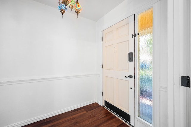 doorway featuring dark hardwood / wood-style flooring