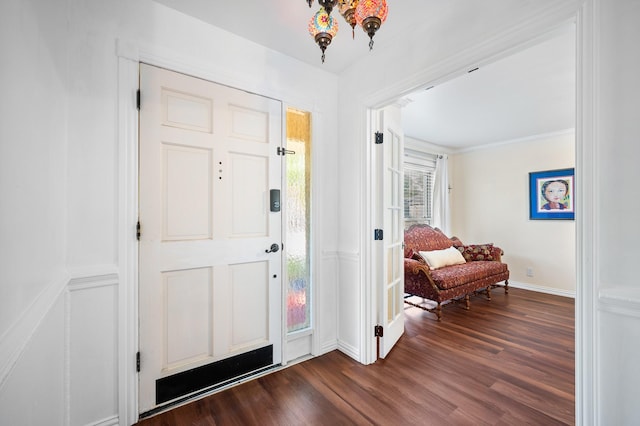 foyer entrance featuring dark hardwood / wood-style floors