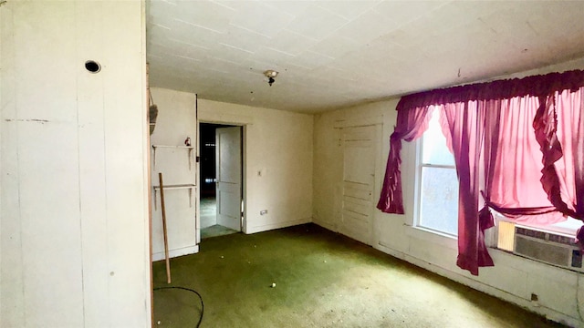 unfurnished room with cooling unit