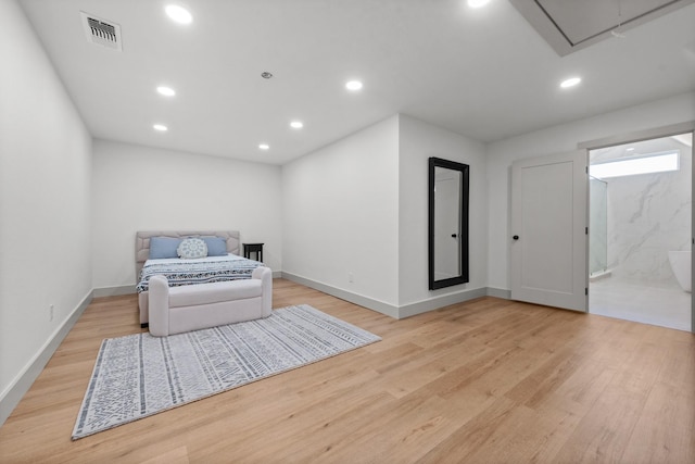 sitting room with light hardwood / wood-style flooring