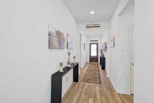 hall featuring light wood-type flooring