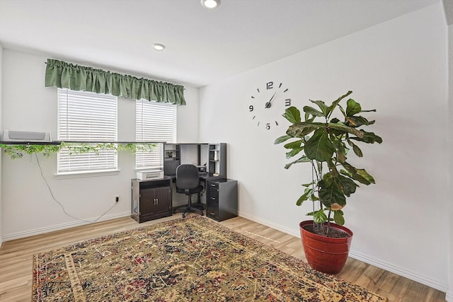 home office featuring hardwood / wood-style floors