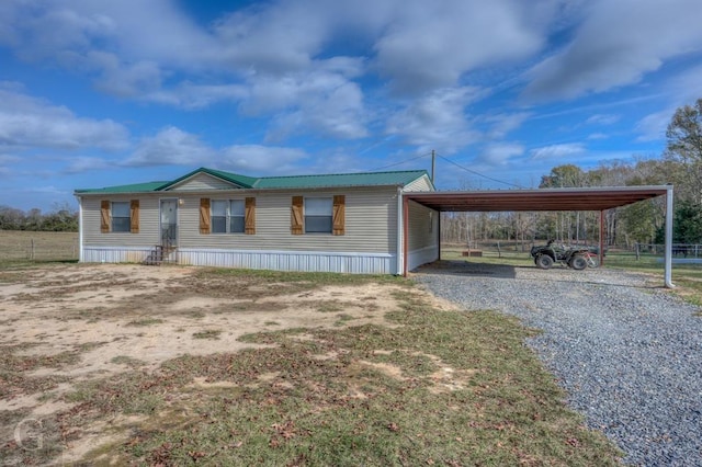 view of front facade featuring a carport