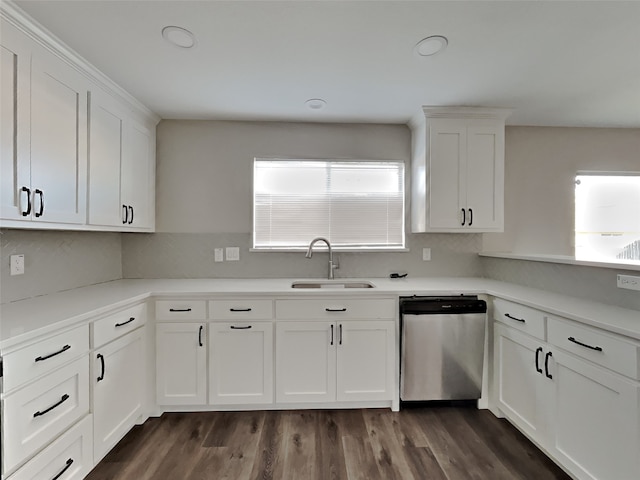 kitchen featuring white cabinetry, dishwasher, sink, and dark wood-type flooring