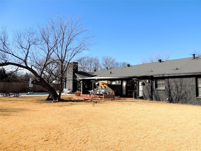 back of property featuring a patio area