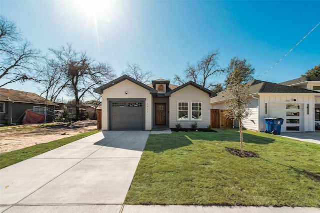 ranch-style home featuring a garage and a front lawn