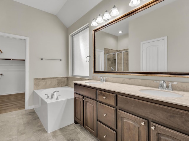 14824 Angel Trace Dr, Aledo, TX 76008 - bathroom with a sink, a garden tub, a stall shower, and double vanity