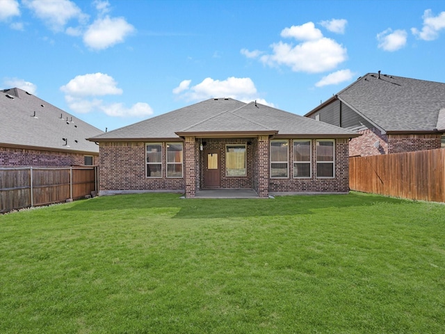 14824 Angel Trace Dr, Aledo, TX 76008 - rear view of property featuring a yard, brick siding, roof with shingles, and a fenced backyard