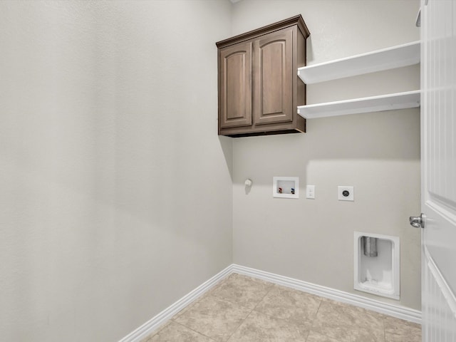 14824 Angel Trace Dr, Aledo, TX 76008 - laundry room with baseboards, gas dryer hookup, washer hookup, light tile patterned flooring, and electric dryer hookup