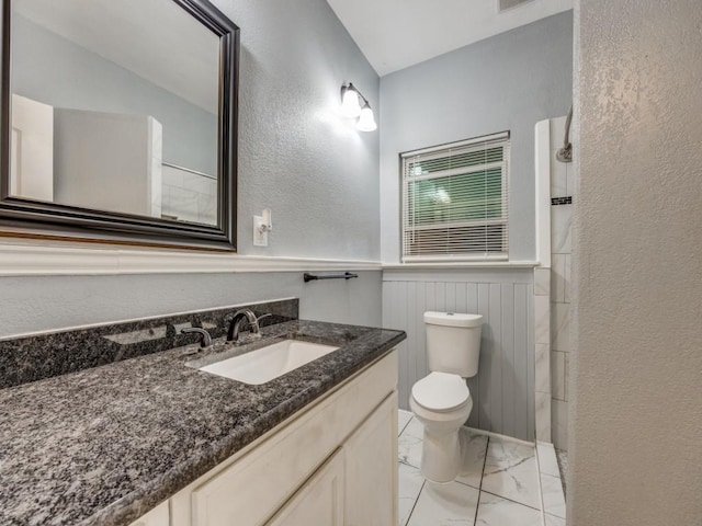 311 W Acheson St, Denison, TX 75020 - bathroom with vanity and toilet