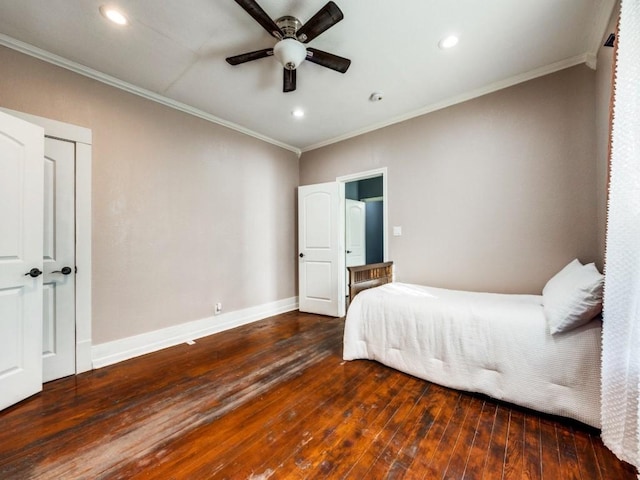 311 W Acheson St, Denison, TX 75020 - unfurnished bedroom featuring dark hardwood / wood-style flooring, ornamental molding, and ceiling fan