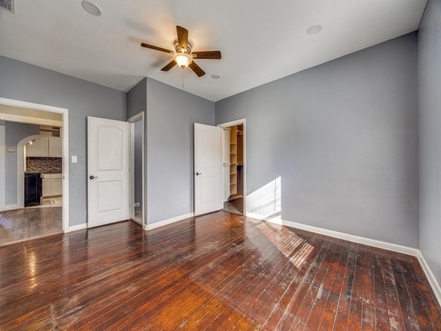 311 W Acheson St, Denison, TX 75020 - unfurnished bedroom featuring dark hardwood / wood-style floors and ceiling fan