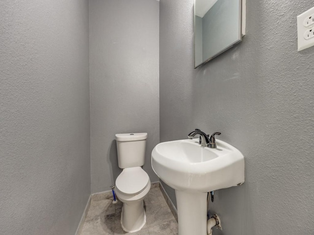 311 W Acheson St, Denison, TX 75020 - bathroom with toilet