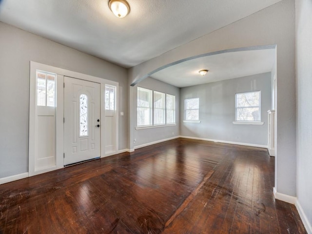 311 W Acheson St, Denison, TX 75020 - entryway featuring dark hardwood / wood-style floors