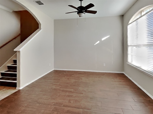 spare room with ceiling fan and light hardwood / wood-style flooring