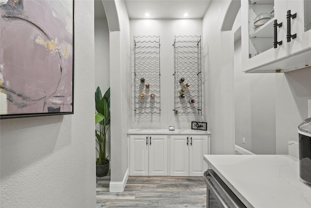 bathroom with vanity and wood-type flooring