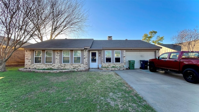 ranch-style house featuring a garage and a front lawn