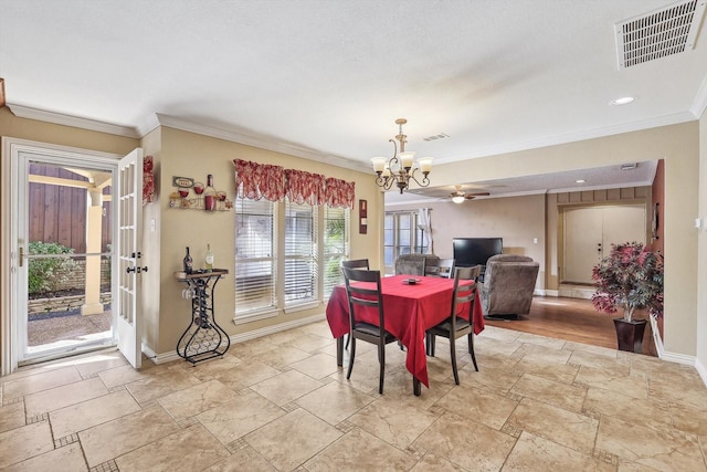 dining area with an inviting chandelier and crown molding