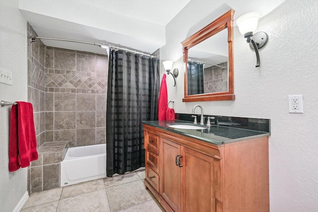 bathroom with tile patterned floors, vanity, and shower / bath combo